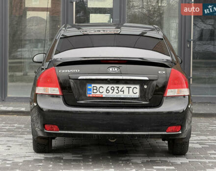 Черный Киа Черато, объемом двигателя 1.98 л и пробегом 180 тыс. км за 5500 $, фото 12 на Automoto.ua