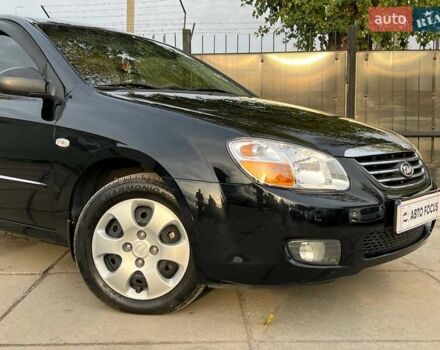 Чорний Кіа Черато, об'ємом двигуна 1.59 л та пробігом 75 тис. км за 6690 $, фото 3 на Automoto.ua