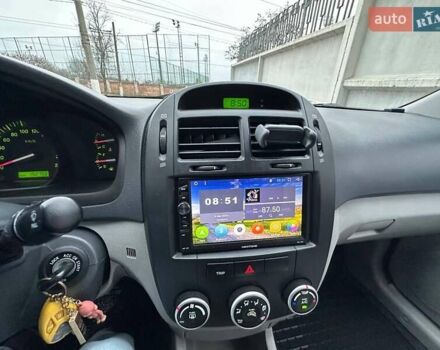 Чорний Кіа Черато, об'ємом двигуна 1.59 л та пробігом 192 тис. км за 4500 $, фото 2 на Automoto.ua