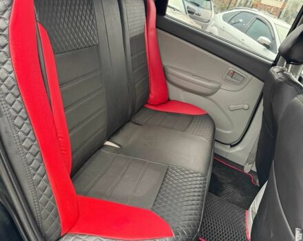 Черный Киа Черато, объемом двигателя 1.6 л и пробегом 258 тыс. км за 5200 $, фото 13 на Automoto.ua