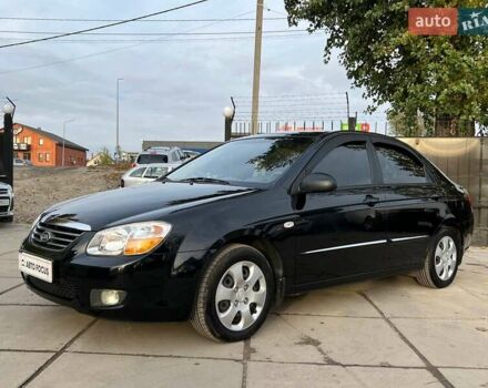 Чорний Кіа Черато, об'ємом двигуна 1.59 л та пробігом 75 тис. км за 6690 $, фото 2 на Automoto.ua