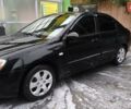 Чорний Кіа Черато, об'ємом двигуна 1.6 л та пробігом 192 тис. км за 4200 $, фото 1 на Automoto.ua