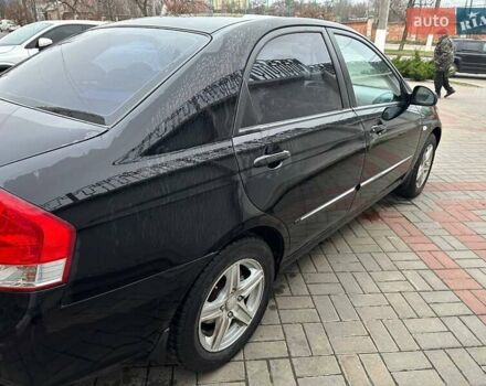 Чорний Кіа Черато, об'ємом двигуна 1.59 л та пробігом 192 тис. км за 4500 $, фото 7 на Automoto.ua
