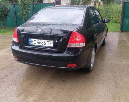 Черный Киа Черато, объемом двигателя 1.6 л и пробегом 208 тыс. км за 4700 $, фото 4 на Automoto.ua