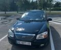 Черный Киа Черато, объемом двигателя 1.59 л и пробегом 191 тыс. км за 5000 $, фото 1 на Automoto.ua