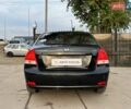 Чорний Кіа Черато, об'ємом двигуна 1.59 л та пробігом 76 тис. км за 5690 $, фото 5 на Automoto.ua