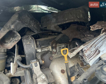 Черный Киа Черато, объемом двигателя 1.98 л и пробегом 95 тыс. км за 1650 $, фото 3 на Automoto.ua