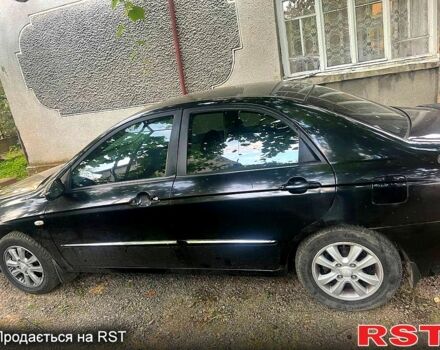 Чорний Кіа Черато, об'ємом двигуна 1.6 л та пробігом 330 тис. км за 2700 $, фото 2 на Automoto.ua