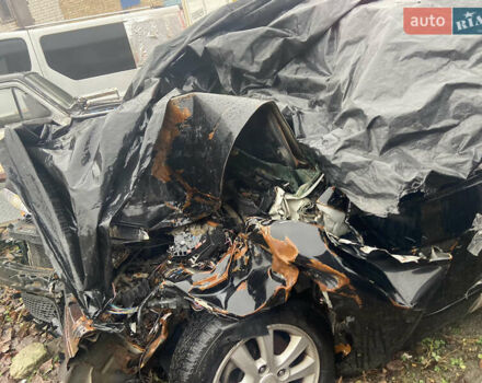 Черный Киа Черато, объемом двигателя 1.98 л и пробегом 95 тыс. км за 1650 $, фото 4 на Automoto.ua