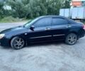 Чорний Кіа Черато, об'ємом двигуна 1.6 л та пробігом 248 тис. км за 2550 $, фото 1 на Automoto.ua