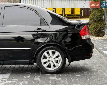 Черный Киа Черато, объемом двигателя 1.98 л и пробегом 180 тыс. км за 5500 $, фото 8 на Automoto.ua