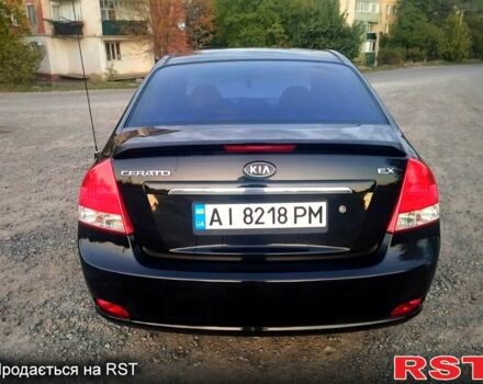 Черный Киа Черато, объемом двигателя 1.6 л и пробегом 272 тыс. км за 4700 $, фото 1 на Automoto.ua