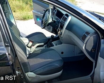 Черный Киа Черато, объемом двигателя 1.6 л и пробегом 178 тыс. км за 5500 $, фото 9 на Automoto.ua