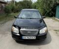 Чорний Кіа Черато, об'ємом двигуна 1.6 л та пробігом 180 тис. км за 4300 $, фото 1 на Automoto.ua