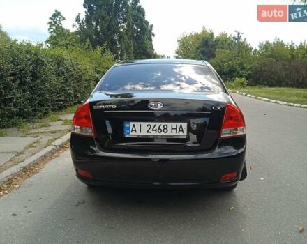 Чорний Кіа Черато, об'ємом двигуна 1.6 л та пробігом 200 тис. км за 4500 $, фото 2 на Automoto.ua