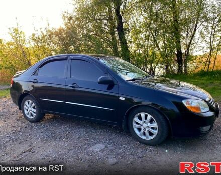 Черный Киа Черато, объемом двигателя 1.6 л и пробегом 272 тыс. км за 3850 $, фото 1 на Automoto.ua