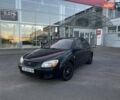 Чорний Кіа Черато, об'ємом двигуна 1.6 л та пробігом 299 тис. км за 4500 $, фото 1 на Automoto.ua