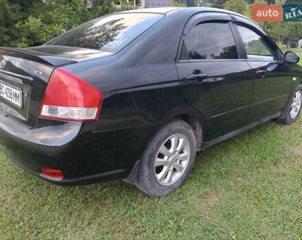 Черный Киа Черато, объемом двигателя 1.59 л и пробегом 237 тыс. км за 3900 $, фото 30 на Automoto.ua