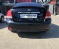 Чорний Кіа Черато, об'ємом двигуна 1.6 л та пробігом 260 тис. км за 4700 $, фото 7 на Automoto.ua