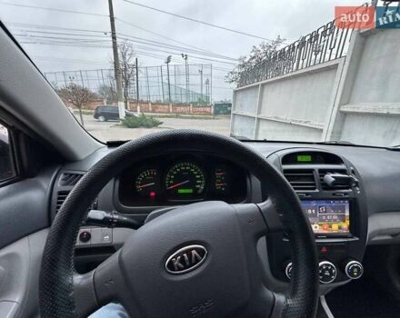 Чорний Кіа Черато, об'ємом двигуна 1.59 л та пробігом 192 тис. км за 4500 $, фото 1 на Automoto.ua