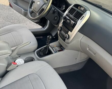 Черный Киа Черато, объемом двигателя 1.6 л и пробегом 156 тыс. км за 5500 $, фото 15 на Automoto.ua