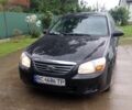 Чорний Кіа Черато, об'ємом двигуна 1.6 л та пробігом 208 тис. км за 4700 $, фото 1 на Automoto.ua