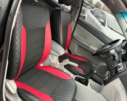 Черный Киа Черато, объемом двигателя 1.6 л и пробегом 258 тыс. км за 5200 $, фото 3 на Automoto.ua