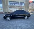 Черный Киа Черато, объемом двигателя 1.59 л и пробегом 166 тыс. км за 4800 $, фото 5 на Automoto.ua