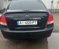 Черный Киа Черато, объемом двигателя 2 л и пробегом 262 тыс. км за 4800 $, фото 2 на Automoto.ua