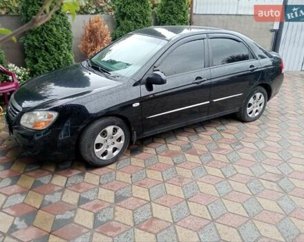 Черный Киа Черато, объемом двигателя 1.6 л и пробегом 260 тыс. км за 3800 $, фото 4 на Automoto.ua