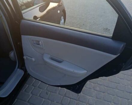 Чорний Кіа Черато, об'ємом двигуна 1.6 л та пробігом 232 тис. км за 4250 $, фото 11 на Automoto.ua