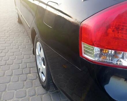 Чорний Кіа Черато, об'ємом двигуна 1.6 л та пробігом 232 тис. км за 4250 $, фото 4 на Automoto.ua