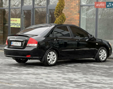 Черный Киа Черато, объемом двигателя 1.98 л и пробегом 180 тыс. км за 5500 $, фото 15 на Automoto.ua
