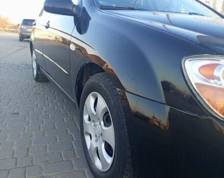 Чорний Кіа Черато, об'ємом двигуна 1.6 л та пробігом 232 тис. км за 4250 $, фото 3 на Automoto.ua