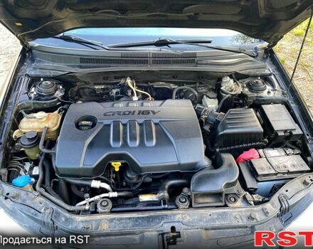 Черный Киа Черато, объемом двигателя 1.6 л и пробегом 272 тыс. км за 3850 $, фото 2 на Automoto.ua