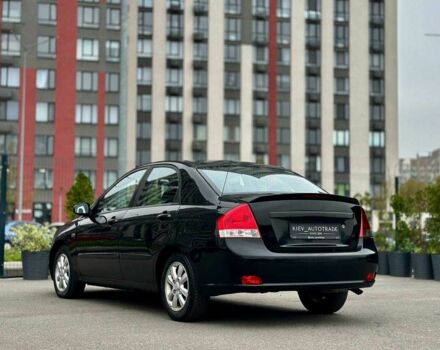 Чорний Кіа Черато, об'ємом двигуна 2 л та пробігом 270 тис. км за 4000 $, фото 6 на Automoto.ua
