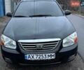 Чорний Кіа Черато, об'ємом двигуна 1.6 л та пробігом 200 тис. км за 4500 $, фото 1 на Automoto.ua