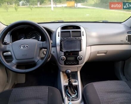 Черный Киа Черато, объемом двигателя 1.59 л и пробегом 237 тыс. км за 3900 $, фото 11 на Automoto.ua