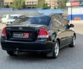 Чорний Кіа Черато, об'ємом двигуна 1.6 л та пробігом 239 тис. км за 5390 $, фото 5 на Automoto.ua