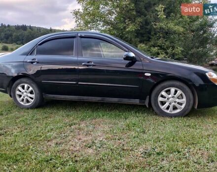 Черный Киа Черато, объемом двигателя 1.59 л и пробегом 237 тыс. км за 3900 $, фото 29 на Automoto.ua