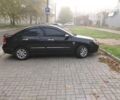 Чорний Кіа Черато, об'ємом двигуна 2 л та пробігом 81 тис. км за 7900 $, фото 1 на Automoto.ua