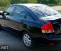 Черный Киа Черато, объемом двигателя 1.6 л и пробегом 178 тыс. км за 5500 $, фото 6 на Automoto.ua