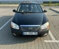 Черный Киа Черато, объемом двигателя 2 л и пробегом 164 тыс. км за 5500 $, фото 1 на Automoto.ua