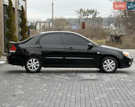 Черный Киа Черато, объемом двигателя 1.98 л и пробегом 180 тыс. км за 5500 $, фото 10 на Automoto.ua
