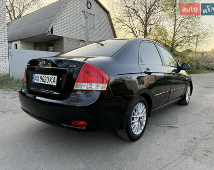 Черный Киа Черато, объемом двигателя 1.6 л и пробегом 190 тыс. км за 4300 $, фото 23 на Automoto.ua