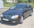 Чорний Кіа Черато, об'ємом двигуна 1.6 л та пробігом 126 тис. км за 6800 $, фото 1 на Automoto.ua