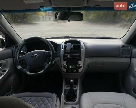 Черный Киа Черато, объемом двигателя 2 л и пробегом 173 тыс. км за 4800 $, фото 16 на Automoto.ua