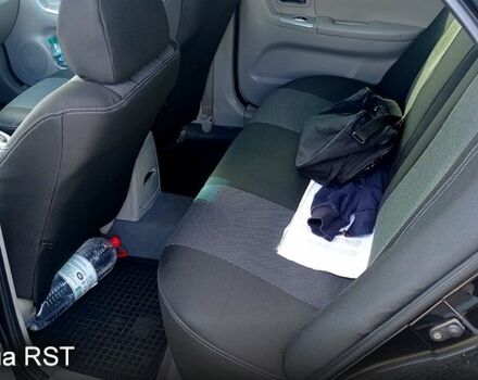 Черный Киа Черато, объемом двигателя 1.6 л и пробегом 178 тыс. км за 5500 $, фото 11 на Automoto.ua