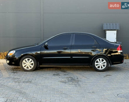 Черный Киа Черато, объемом двигателя 1.98 л и пробегом 180 тыс. км за 5750 $, фото 5 на Automoto.ua