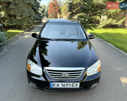 Черный Киа Черато, объемом двигателя 2 л и пробегом 110 тыс. км за 6300 $, фото 18 на Automoto.ua